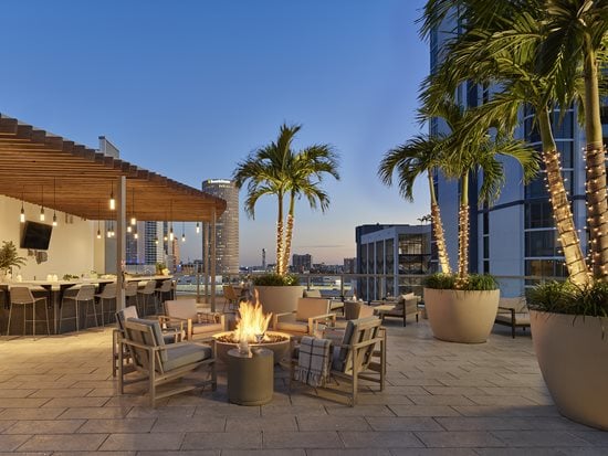 AVE Tampa Riverwalk outdoor terrace at dusk